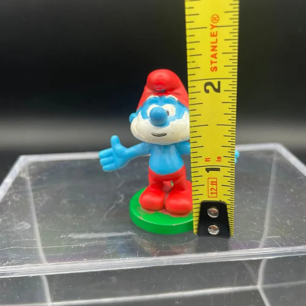 Vintage 2010 Peyo Smurf Figurine on Green Base PVC Toy Collectible